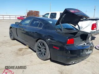 2013 Dodge Charger SE with VIN 2C3CDXBG7DH521114, listed as a IAAI auction lot 41756011 with 152,491 mi miles. Bid and sale history available at carsss.com. Image 3.