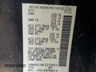 2011 Nissan Titan Pro-4X z VIN 1N6BA0EC2BN325891, wystawiony jako Copart lot #43241505 z przebiegiem Nie podano mil oraz Szkoda całkowita • Salvage title. Historia ofert i sprzedaży dostępna na DreamBid. Obrazek 14.