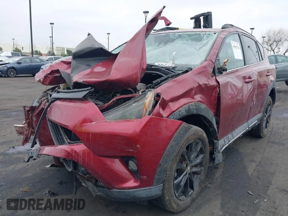 2018 Toyota RAV4 XLE with VIN 2T3RFREVXJW699293, listed as a IAAI auction lot 41881742 with Not Provided miles and . Bid and sale history available at DreamBid. Image 2.