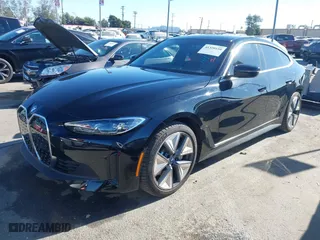 2024 BMW i4 eDrive40 with VIN WBY73AW06RFS52041, listed as a IAAI auction lot 41320110 with NaN miles. Bid and sale history available at carsss.com. Image 20.