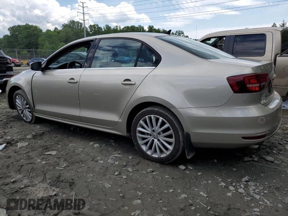 2016 Volkswagen Jetta SEL z VIN 3VWL17AJ3GM205357, wystawiony jako Copart lot #59086395 z przebiegiem 104 939 mil mil oraz Szkoda całkowita • Salvage title. Historia ofert i sprzedaży dostępna na DreamBid. Obrazek 2.