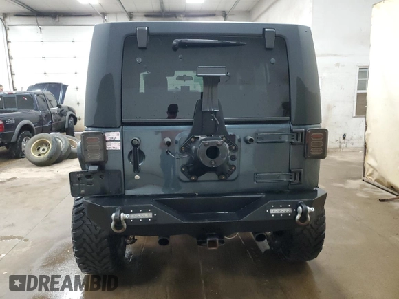 2007 Jeep Wrangler Unlimited Rubicon with VIN 1J4GA69197L100286, listed as a Copart auction lot 54210635 with Not provided miles and Clean title. Bid and sale history available at DreamBid. Image 6.