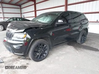 2019 Jeep Grand Cherokee Laredo E with VIN 1C4RJFAG0KC565739, listed as a IAAI auction lot 42039038 with 103,358 mi miles and . Bid and sale history available at DreamBid. Image 2.
