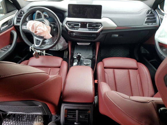 2022 BMW X4 xDrive30i z VIN 5UX33DT02N9J01520, wystawiony jako Copart lot #51488055 z przebiegiem Nie podano mil oraz Szkoda całkowita • Salvage title. Historia ofert i sprzedaży dostępna na DreamBid. Obrazek 8.