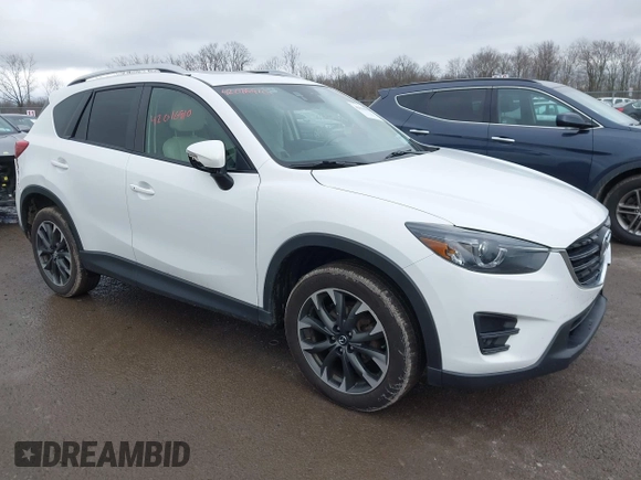 2016 Mazda CX-5 Grand Touring z VIN JM3KE4DY0G0705884, wystawiony jako IAAI lot #42016910 z przebiegiem 73 324 mil mil oraz . Historia ofert i sprzedaży dostępna na DreamBid. Obrazek 1.