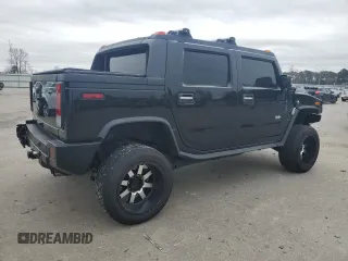 2005 Hummer H2 SUT z VIN 5GRGN22UX5H120312, wystawiony jako Copart lot #43948955 z przebiegiem Nie podano mil oraz Szkoda całkowita • Salvage title. Historia ofert i sprzedaży dostępna na DreamBid. Obrazek 3.