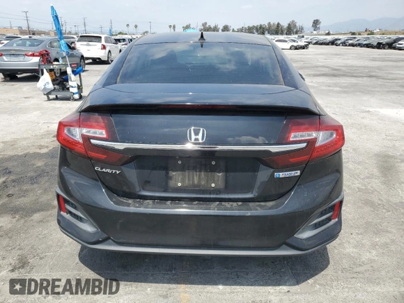 2018 Honda Clarity Plug-In Hybrid with VIN JHMZC5F11JC011244, listed as a Copart auction lot 54581165 with 130,698 mi miles and Salvage Title. Bid and sale history available at carsss.com. Image 6.