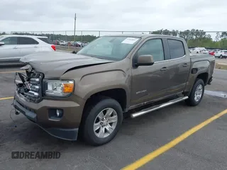 2015 GMC Canyon 2WD SLE with VIN 1GTG5BE38F1229799, listed as a IAAI auction lot 41944801 with 71,165 mi miles. Bid and sale history available at carsss.com. Image 2.