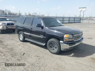2003 GMC Yukon SLT with VIN 1GKEC13Z63R287085, listed as a IAAI auction lot 41833219 with 340,516 mi miles. Bid and sale history available at carsss.com. Image 1.