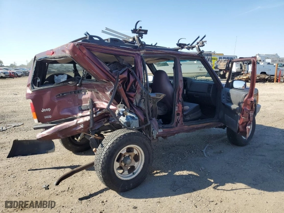 2000 Jeep Cherokee Police with VIN 1J4FF48S3YL141168, listed as a Copart auction lot 71612494 with NaN miles and Salvage Title. Bid and sale history available at carsss.com. Image 3.