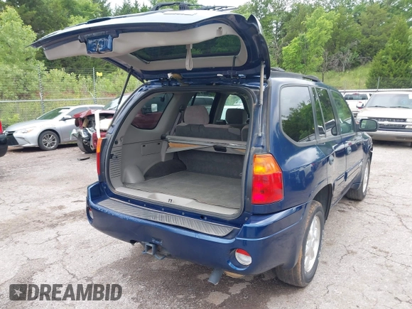 2003 GMC Envoy SLE z VIN 1GKDS13S432414698, wystawiony jako IAAI lot #42338640 z przebiegiem 210 988 mil mil oraz . Historia ofert i sprzedaży dostępna na DreamBid. Obrazek 4.