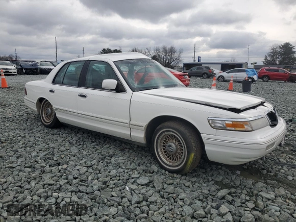 1997 Mercury Grand Marquis LS with VIN 2MELM75W7VX651074, listed as a Copart auction lot 44707425 with Not Provided miles and Salvage Title. Bid and sale history available at DreamBid. Image 4.