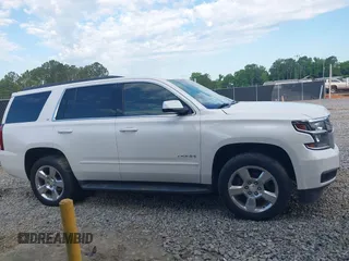 2017 Chevrolet Tahoe LT with VIN 1GNSKBKC3HR356480, listed as a IAAI auction lot 42335162 with 145,892 mi miles and . Bid and sale history available at DreamBid. Image 13.