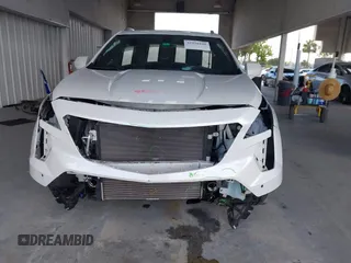 2019 Cadillac XT4 FWD Premium Luxury z VIN 1GYFZCR49KF142039, wystawiony jako IAAI lot #42259448 z przebiegiem 47 620 mil mil oraz . Historia ofert i sprzedaży dostępna na DreamBid. Obrazek 13.