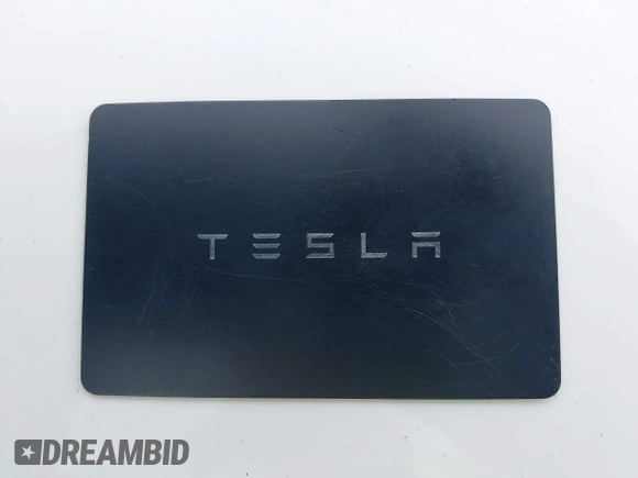 2019 Tesla Model 3 Long Range with VIN 5YJ3E1EB8KF512950, listed as a IAAI auction lot 41836349 with 55,607 mi miles and . Bid and sale history available at DreamBid. Image 11.