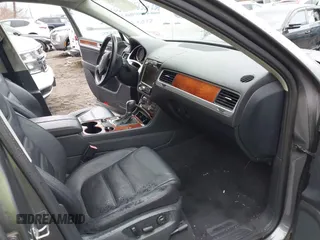 2013 Volkswagen Touareg Lux with VIN WVGEF9BP0DD005082, listed as a IAAI auction lot 41667026 with 140,148 mi miles and . Bid and sale history available at DreamBid. Image 5.