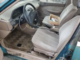 1993 Ford Escort with VIN 1FAPP14J4PW287522, listed as a Copart auction lot 47054555 with 547,514 mi miles and Salvage title. Bid and sale history available at DreamBid. Image 7.