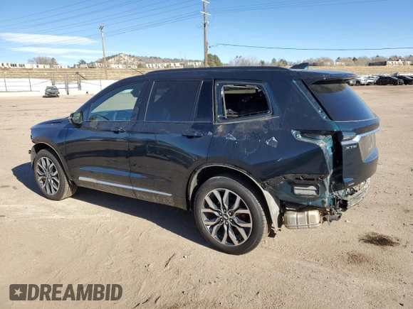 2024 Cadillac XT6 AWD Sport with VIN 1GYKPGRS0RZ736764, listed as a Copart auction lot 84216964 with 3,869 mi miles and Salvage Title. Bid and sale history available at carsss.com. Image 2.