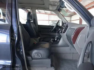 2002 Mitsubishi Montero LTD with VIN JA4MW51R02J056182, listed as a IAAI auction lot 41997067 with 176,963 mi miles. Bid and sale history available at carsss.com. Image 5.