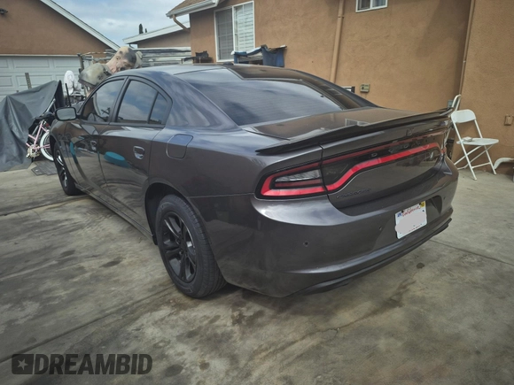2020 Dodge Charger SXT with VIN 2C3CDXBG7LH232748, listed as a IAAI auction lot 42168856 with 26,527 mi miles. Bid and sale history available at carsss.com. Image 3.