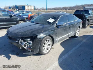 2014 Chevrolet Impala LTZ with VIN 2G1155S31E9105694, listed as a IAAI auction lot 41414595 with 128,828 mi miles. Bid and sale history available at carsss.com. Image 18.