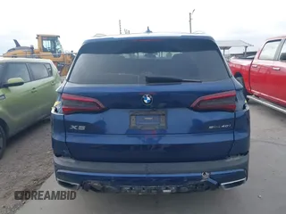 2020 BMW X5 sDrive40i with VIN 5UXCR4C07L9C27998, listed as a IAAI auction lot 41652088 with 59,009 mi miles and . Bid and sale history available at DreamBid. Image 17.