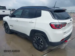 2020 Jeep Compass Trailhawk with VIN 3C4NJDDB3LT118928, listed as a IAAI auction lot 42128120 with 95,477 mi miles and . Bid and sale history available at DreamBid. Image 3.