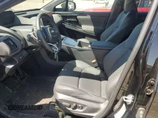 2023 Subaru Solterra Limited z VIN JTMABABA1PA024533, wystawiony jako Copart lot #54735625 z przebiegiem 7604 mil mil oraz Szkody całkowita. Historia ofert i sprzedaży dostępna na DreamBid. Obrazek 7.