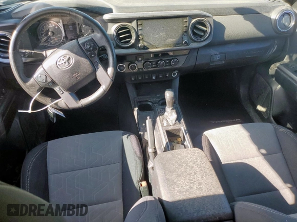 2021 Toyota Tacoma SR z VIN 5TFCZ5AN1MX256607, wystawiony jako Copart lot #52182225 z przebiegiem 44 717 mil mil oraz Szkoda całkowita • Salvage title. Historia ofert i sprzedaży dostępna na DreamBid. Obrazek 8.