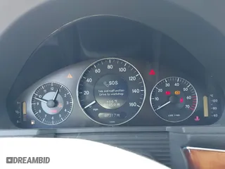 2005 Mercedes-Benz E-Class 3.2L with VIN WDBUF65J15A669561, listed as a IAAI auction lot 41888887 with 87,317 mi miles. Bid and sale history available at carsss.com. Image 7.