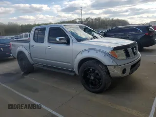 2006 Nissan Frontier SE with VIN 1N6AD07W36C423033, listed as a Copart auction lot 53135935 with 182,467 mi miles and Salvage title. Bid and sale history available at DreamBid. Image 4.