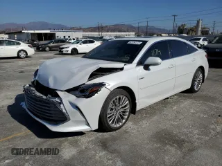 2020 Toyota Avalon Limited Hybrid z VIN 4T1D21FB9LU013719, wystawiony jako Copart lot #65184172 z przebiegiem 18 714 mil mil oraz . Historia ofert i sprzedaży dostępna na DreamBid. Obrazek 2.
