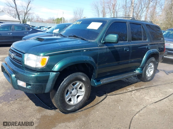 2000 Toyota 4Runner SR5 with VIN JT3HN86R1Y0323093, listed as a IAAI auction lot 41769405 with 156,905 mi miles. Bid and sale history available at carsss.com. Image 2.