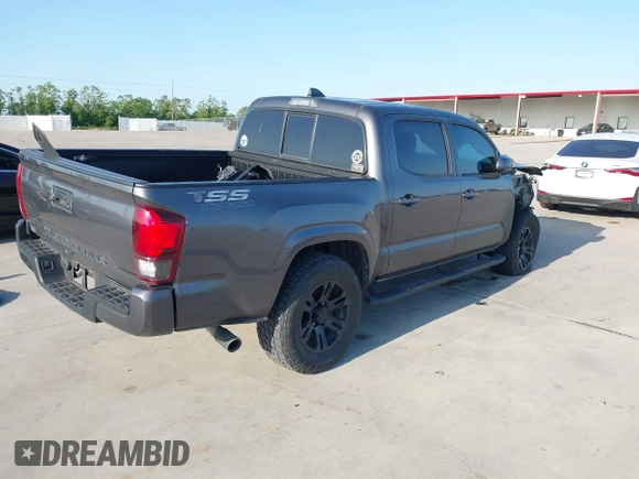2021 Toyota Tacoma SR with VIN 3TYAX5GN5MT032481, listed as a IAAI auction lot 41979320 with 51,843 mi miles and . Bid and sale history available at DreamBid. Image 4.