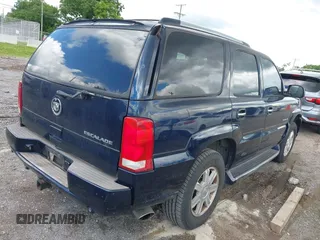 2004 Cadillac Escalade z VIN 1GYEK63N84R211615, wystawiony jako IAAI lot #42394289 z przebiegiem 298 520 mil mil oraz . Historia ofert i sprzedaży dostępna na DreamBid. Obrazek 4.