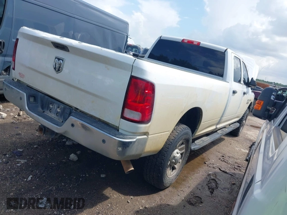 2018 Ram 2500 Tradesman z VIN 3C6UR5HJ5JG284053, wystawiony jako IAAI lot #42672148 z przebiegiem 158 783 mil mil oraz . Historia ofert i sprzedaży dostępna na DreamBid. Obrazek 4.