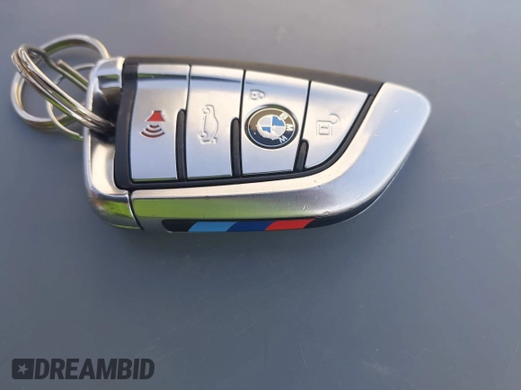 2018 BMW 5 Series 530e xDrive with VIN WBAJB1C51JB374308, listed as a IAAI auction lot 41965038 with 122,791 mi miles and . Bid and sale history available at carsss.com. Image 11.