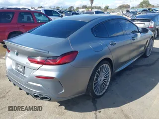 2023 BMW 8 Series with VIN WBAGX0C10PCM53569, listed as a IAAI auction lot 41539150 with Not provided miles and . Bid and sale history available at DreamBid. Image 4.