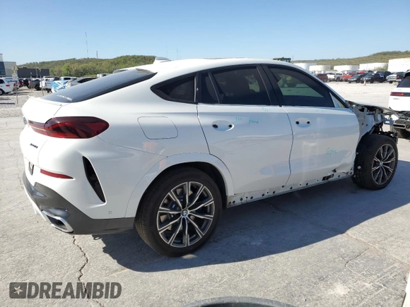2020 BMW X6 xDrive40i z VIN 5UXCY6C00L9D45082, wystawiony jako Copart lot #52588665 z przebiegiem 40 810 mil mil oraz Szkoda całkowita • Salvage title. Historia ofert i sprzedaży dostępna na DreamBid. Obrazek 3.