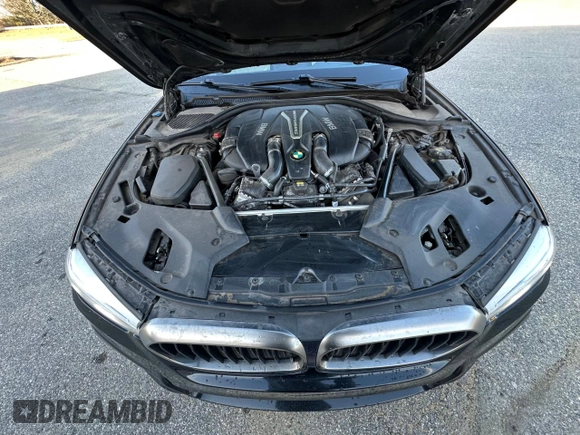 2018 BMW 5 Series M550i xDrive with VIN WBAJB9C55JB035226, listed as a Copart auction lot 50197815 with 156,183 mi miles and Clean title. Bid and sale history available at DreamBid. Image 7.