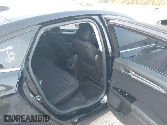 2015 Ford Fusion SE Hybrid with VIN 3FA6P0LU8FR310626, listed as a IAAI auction lot 40048581 with 124,086 mi miles and . Bid and sale history available at DreamBid. Image 8.