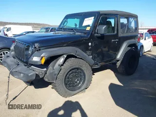 2021 Jeep Wrangler Sport with VIN 1C4GJXAG8MW559296, listed as a IAAI auction lot 41759848 with 47,374 mi miles and . Bid and sale history available at DreamBid. Image 2.