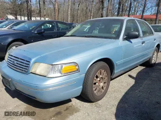 2004 Ford Crown Victoria LX with VIN 2FAFP74W64X121657, listed as a IAAI auction lot 41715463 with 205,885 mi miles. Bid and sale history available at carsss.com. Image 2.