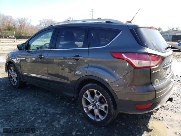 2015 Ford Escape Titanium with VIN 1FMCU0J95FUA74512, listed as a Copart auction lot 49867515 with 165,739 mi miles and Salvage Title. Bid and sale history available at carsss.com. Image 2.