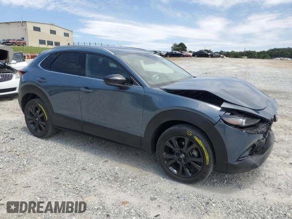 2023 Mazda CX-30 Premium with VIN 3MVDMBDY1PM509621, listed as a Copart auction lot 58316715 with 27,979 mi miles and Salvage title. Bid and sale history available at DreamBid. Image 4.