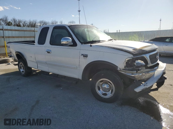 2000 Ford F-150 XL with VIN 1FTRX18W5YKB13685, listed as a Copart auction lot 48286865 with 249,053 mi miles and Salvage Title. Bid and sale history available at carsss.com. Image 4.