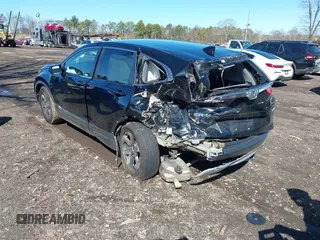 2019 Honda CR-V EX with VIN 2HKRW2H5XKH674504, listed as a IAAI auction lot 41823838 with 104,281 mi miles. Bid and sale history available at carsss.com. Image 2.