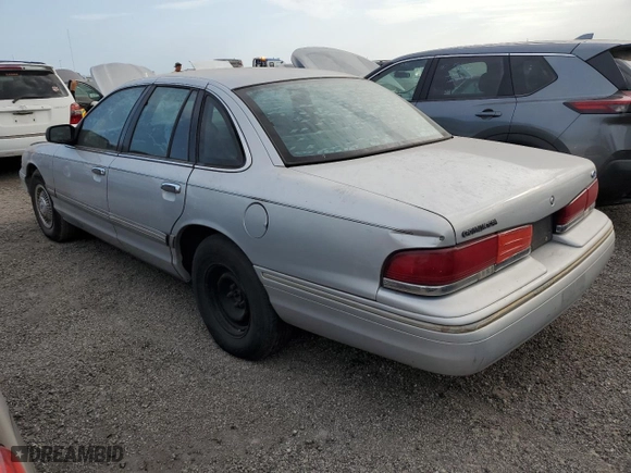 1997 Ford Crown Victoria with VIN 2FALP73W2VX230784, listed as a Copart auction lot 76339234 with 234,792 mi miles and Non Repairable. Bid and sale history available at carsss.com. Image 2.