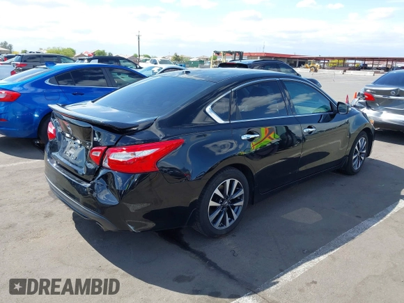 2016 Nissan Altima SR with VIN 1N4AL3AP6GC116956, listed as a IAAI auction lot 42068274 with 148,696 mi miles and . Bid and sale history available at DreamBid. Image 4.