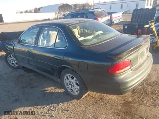 2001 Oldsmobile Intrigue GX with VIN 1G3WH52H11F127437, listed as a IAAI auction lot 41446574 with 1 mi miles. Bid and sale history available at carsss.com. Image 3.